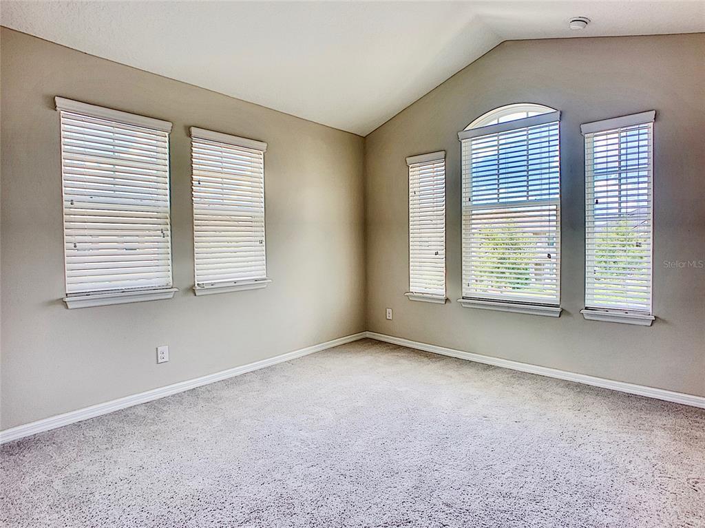 8620 Wellington Blue Lane Windermere, FL 34786 - Photo 16 of 22 an empty room with a window