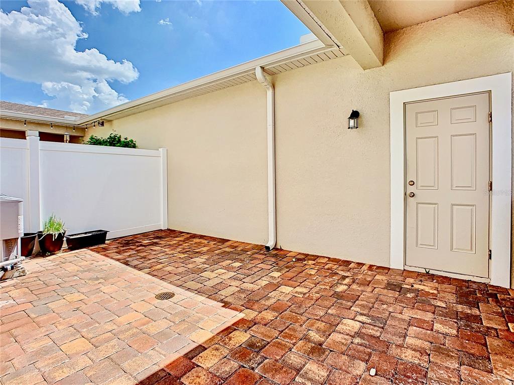 8620 Wellington Blue Lane Windermere, FL 34786 - Photo 21 of 22 a bed room with a bed and a night stand