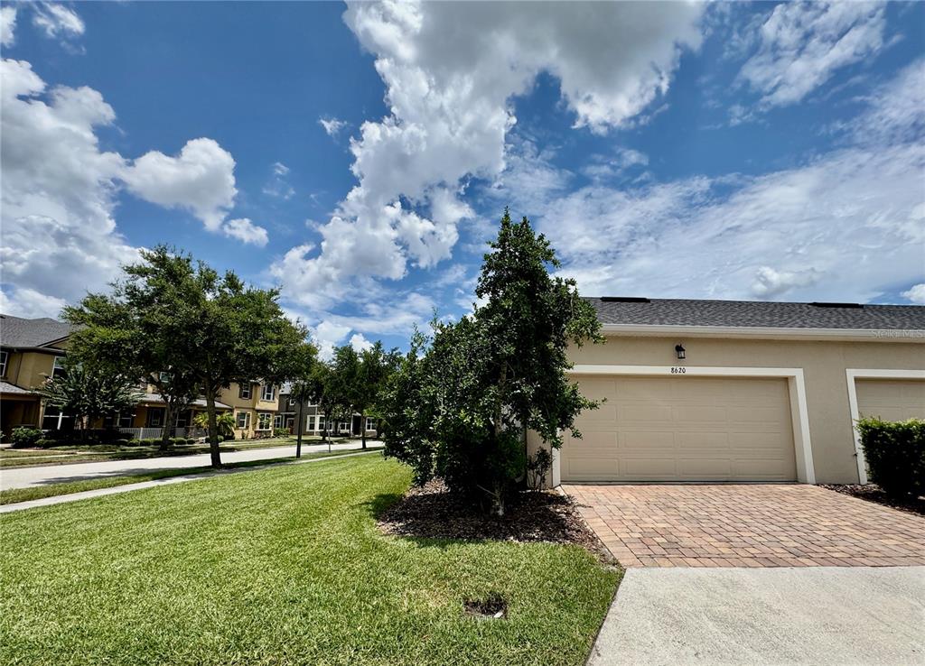 8620 Wellington Blue Lane Windermere, FL 34786 - Photo 22 of 22 a view of a garden