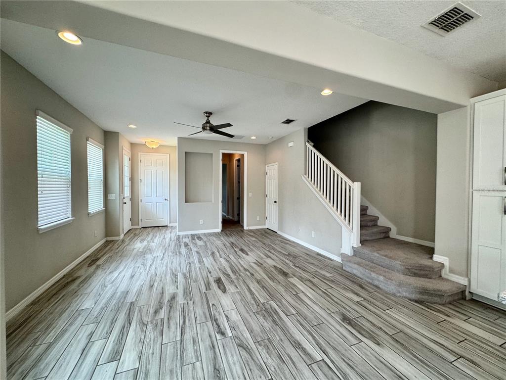 8620 Wellington Blue Lane Windermere, FL 34786 - Photo 5 of 22 a view of entryway with wooden floor