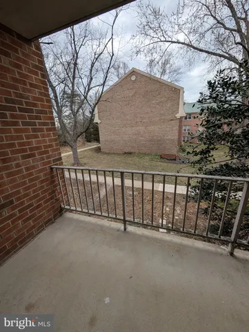 a view of a balcony with a swing