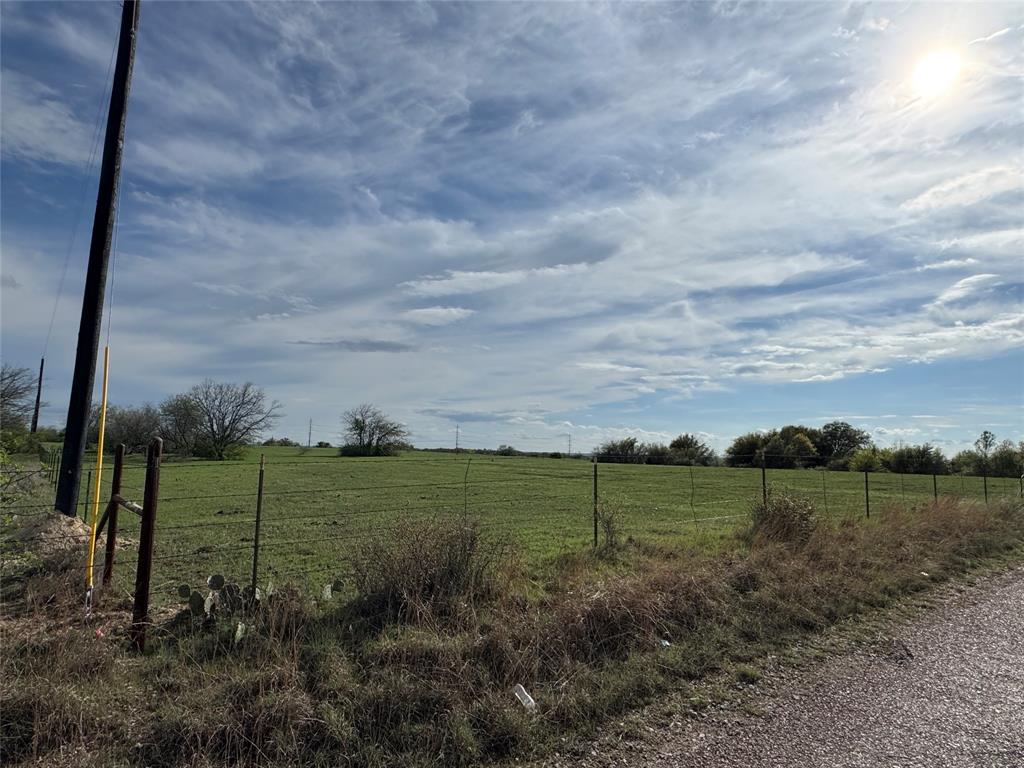 0 Brammer Drive Rhome, TX 76078 - Photo 4 of 7 View of yard featuring fence and a rural view