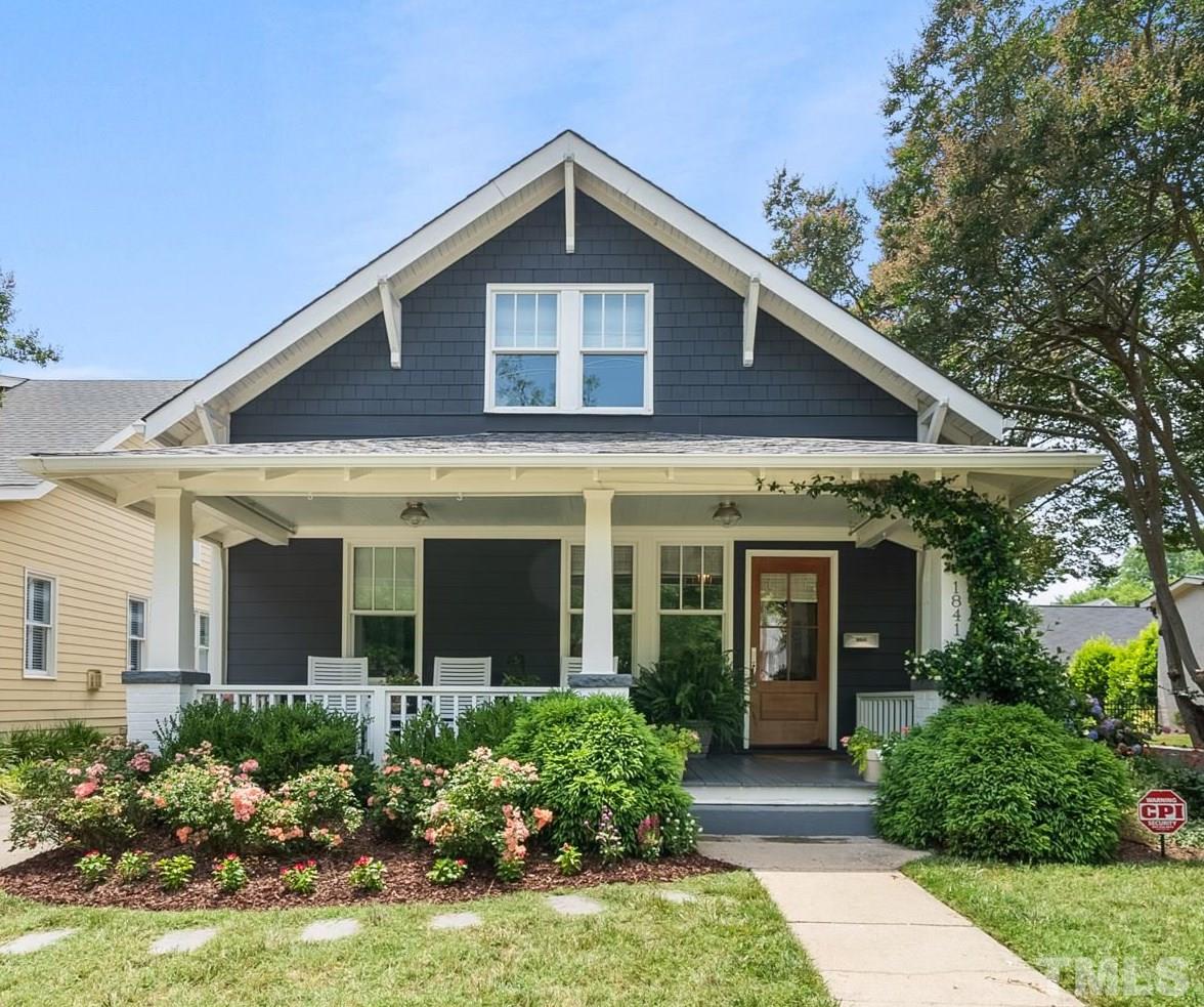 1841 Reaves Drive Raleigh, NC 27608 - Photo 1 of 25 a front view of a house with a yard