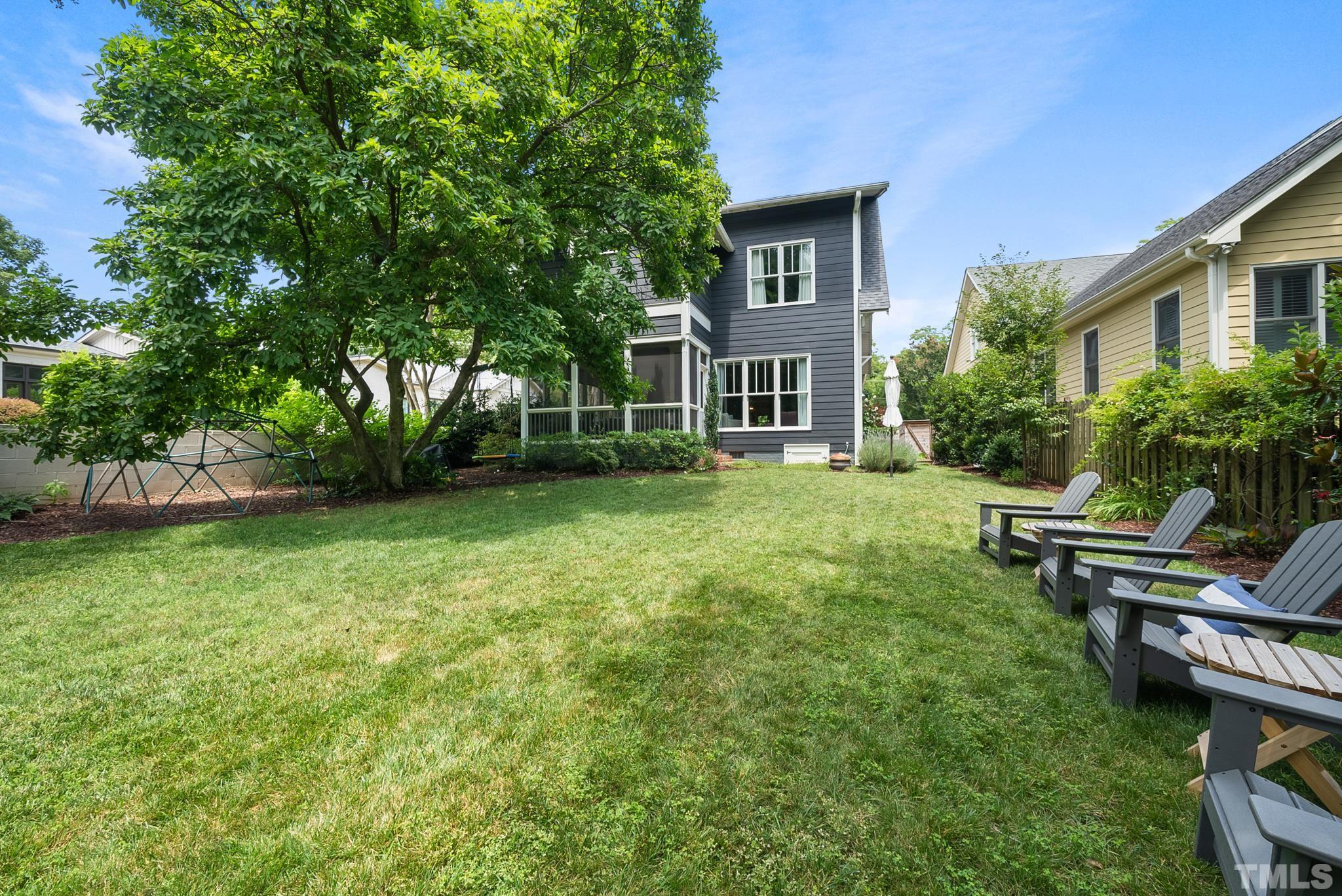 1841 Reaves Drive Raleigh, NC 27608 - Photo 25 of 25 a view of a house with a backyard and sitting area