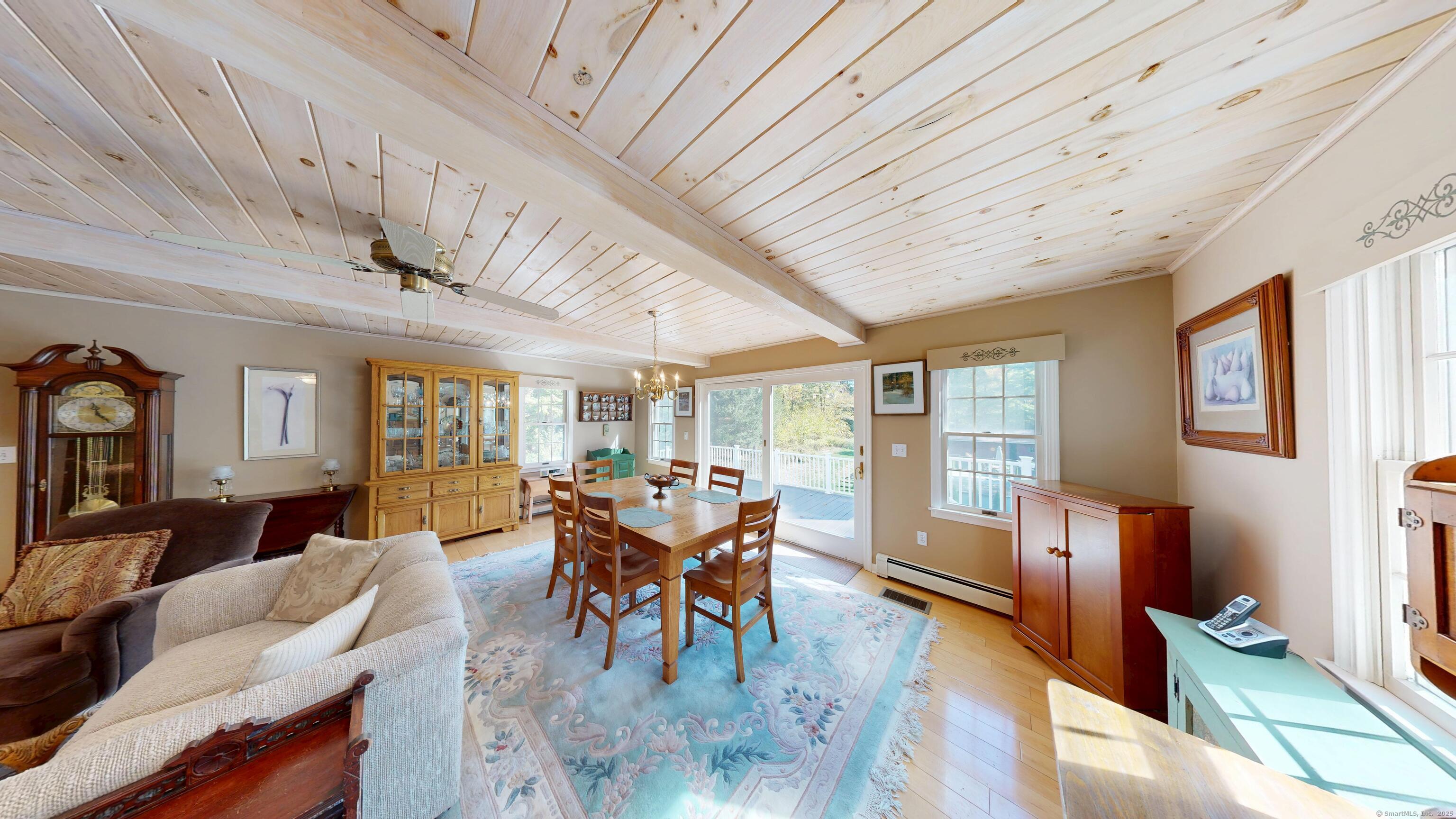 214 Mountain Road Cheshire, CT 06410 - Photo 13 of 40 a living room with furniture and wooden floor