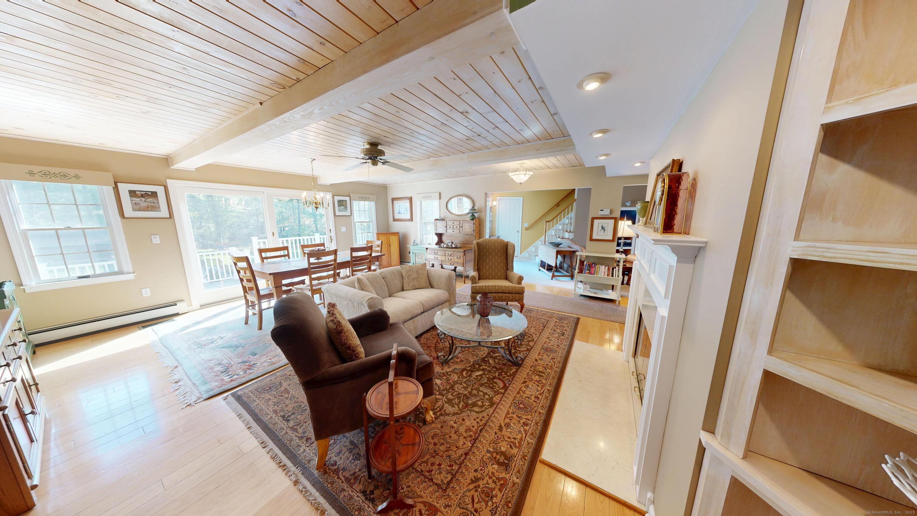 214 Mountain Road Cheshire, CT 06410 - Photo 16 of 40 a living room with furniture and a table