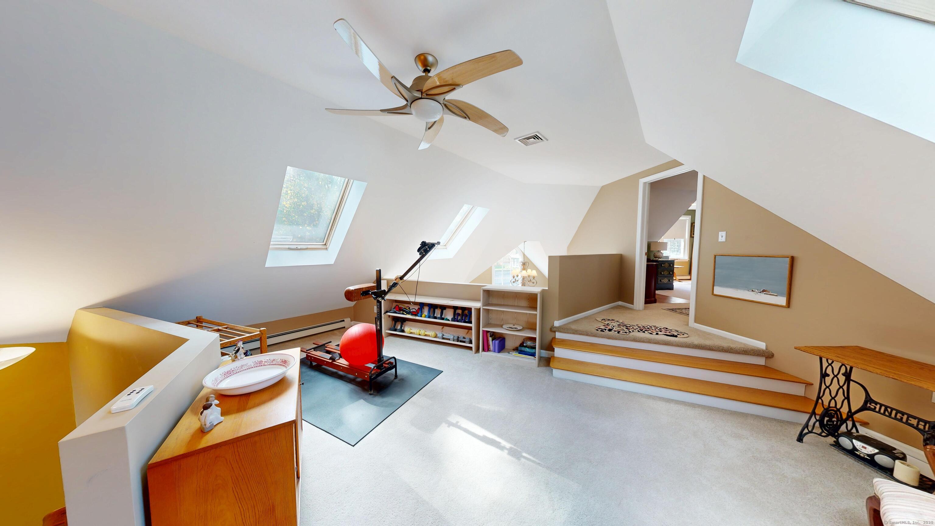 214 Mountain Road Cheshire, CT 06410 - Photo 18 of 40 a living room with furniture and air hockey table