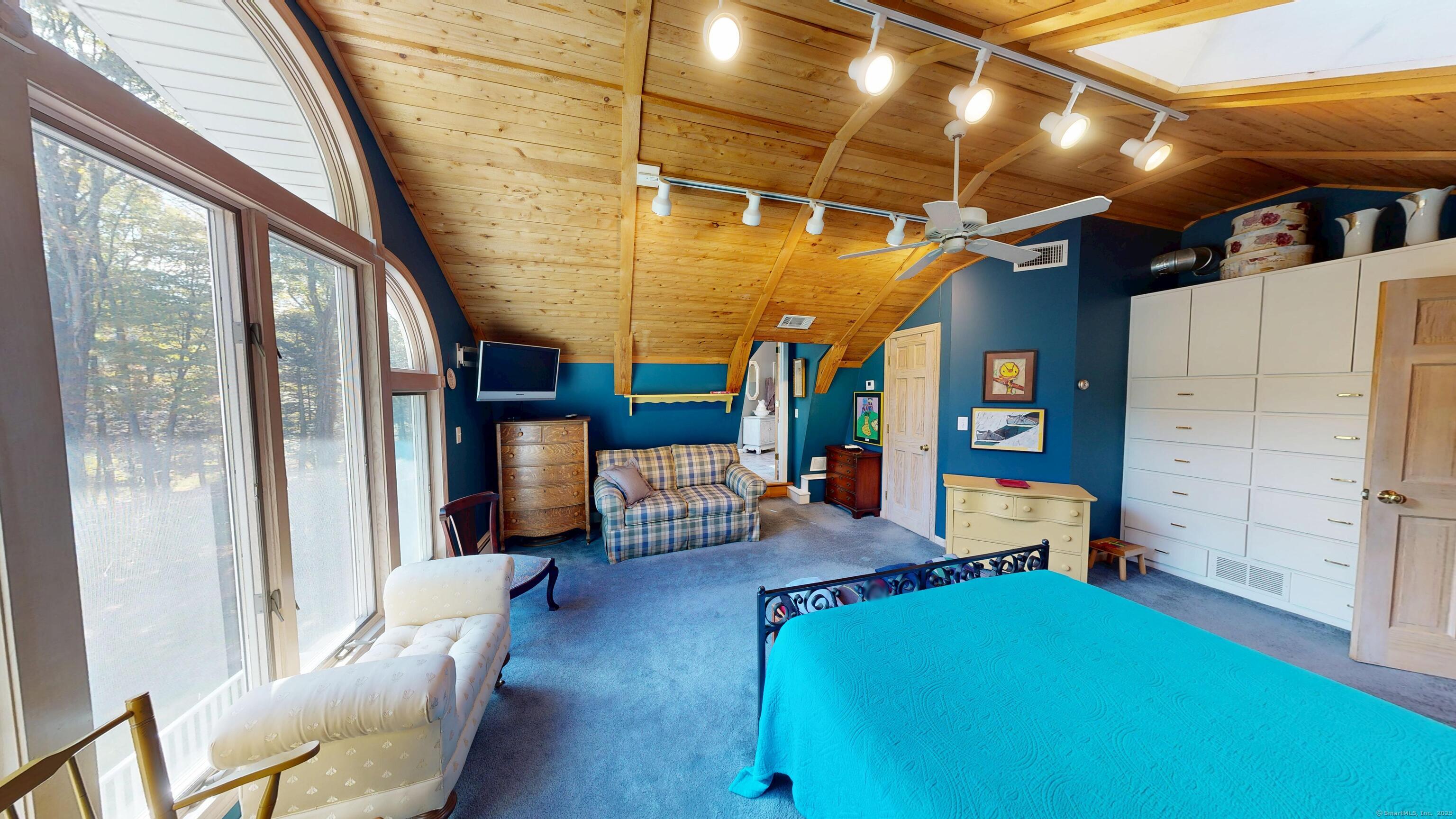 214 Mountain Road Cheshire, CT 06410 - Photo 23 of 40 a view of a livingroom with furniture and a window