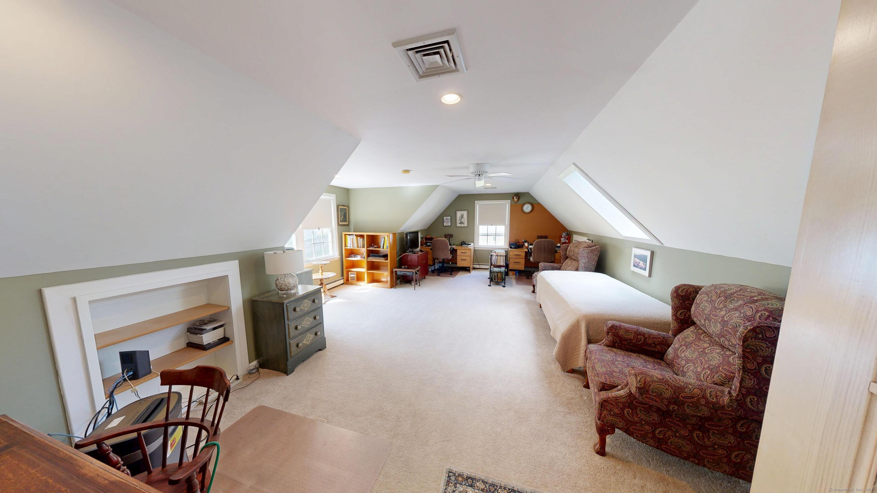 214 Mountain Road Cheshire, CT 06410 - Photo 27 of 40 a living room with furniture and a couch