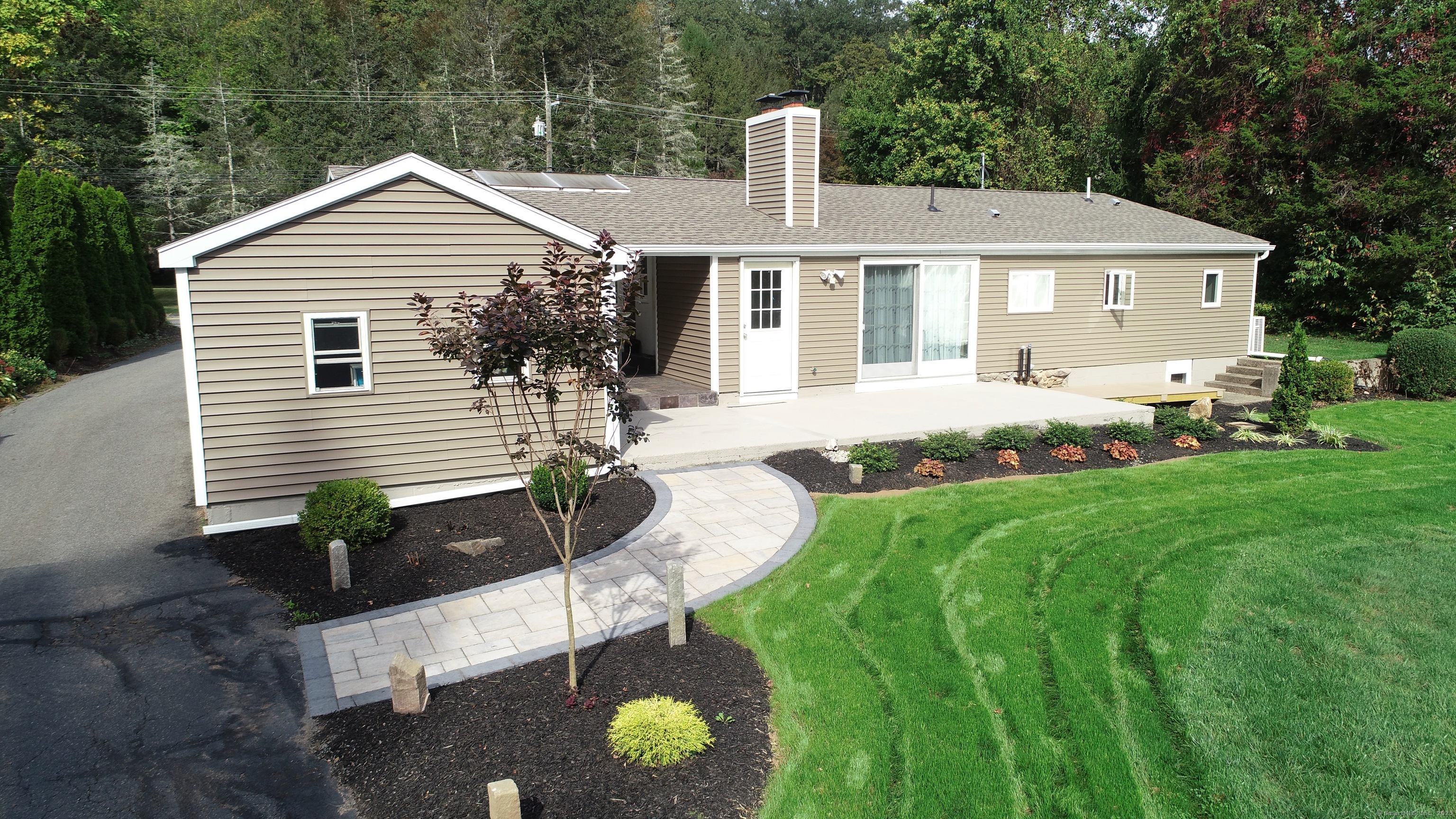 214 Mountain Road Cheshire, CT 06410 - Photo 34 of 40 a front view of a house with a yard