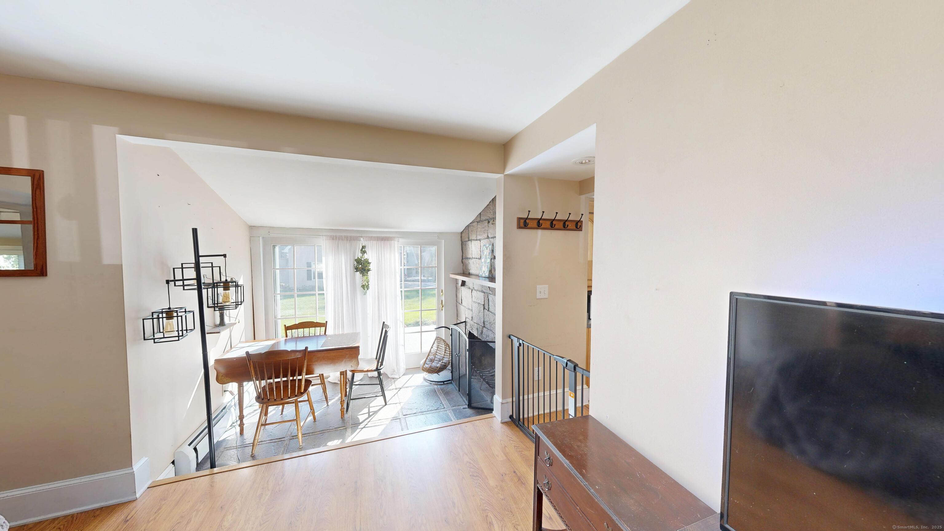214 Mountain Road Cheshire, CT 06410 - Photo 37 of 40 a view of a livingroom with furniture and a flat screen tv