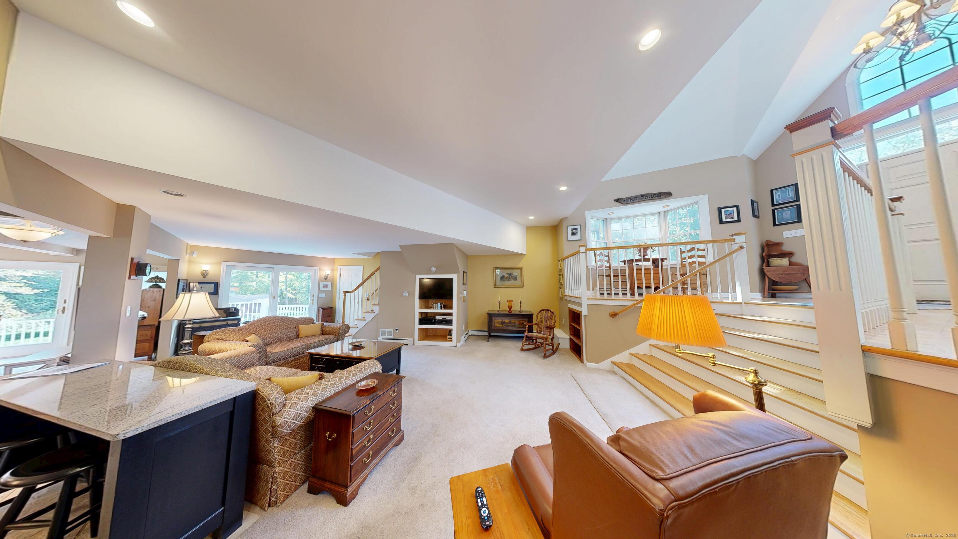 214 Mountain Road Cheshire, CT 06410 - Photo 6 of 40 a living room with furniture kitchen view and a large window