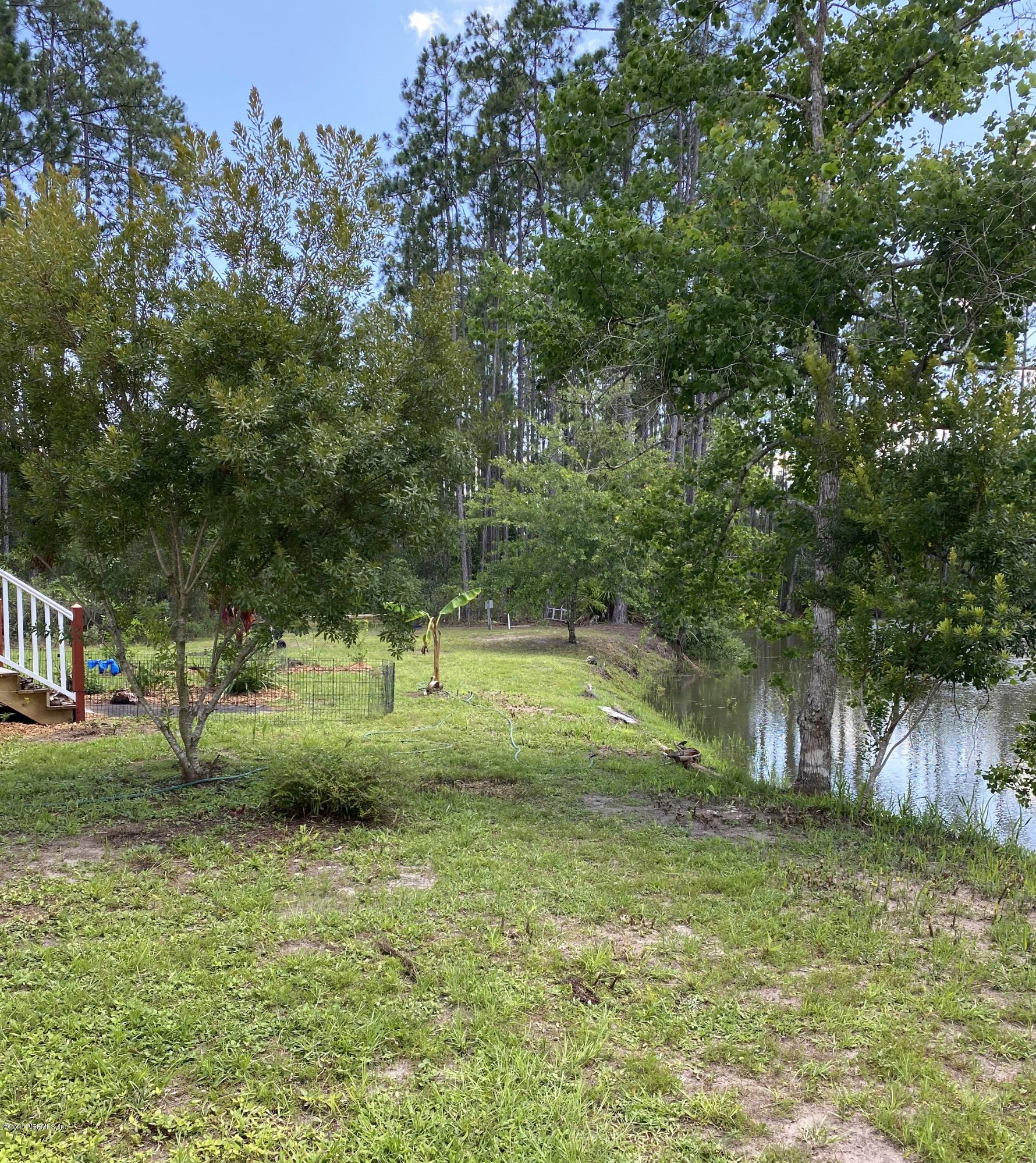 219 Long Road Interlachen, FL 32148 - Photo 4 of 21 Back Yard