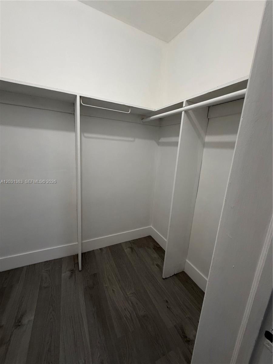 324 Surfside Boulevard, Unit 7 Surfside, FL 33154 - Photo 8 of 8 a view of an empty walk in closet