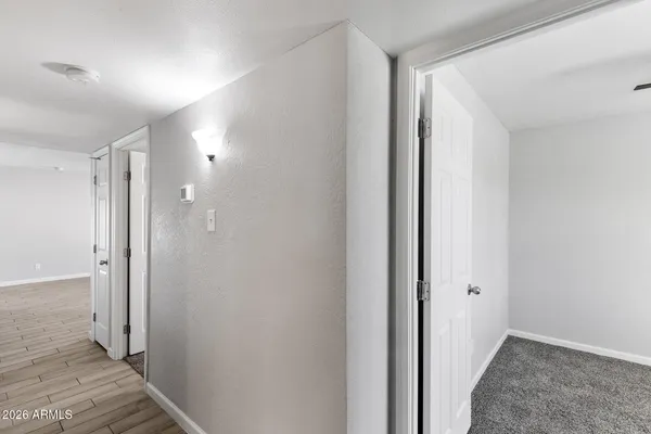 a view of a bathroom with a glass door and shower