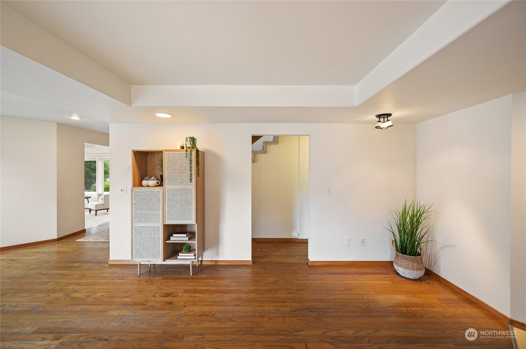 5730 Sand Road Bellingham, WA 98226 - Photo 19 of 40 a view of an empty room with wooden floor and a window