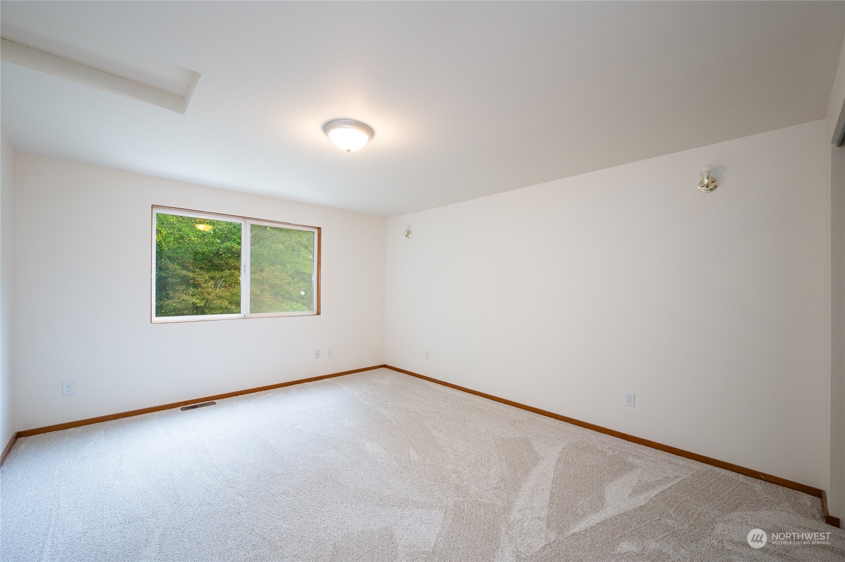 5730 Sand Road Bellingham, WA 98226 - Photo 27 of 40 an empty room with windows