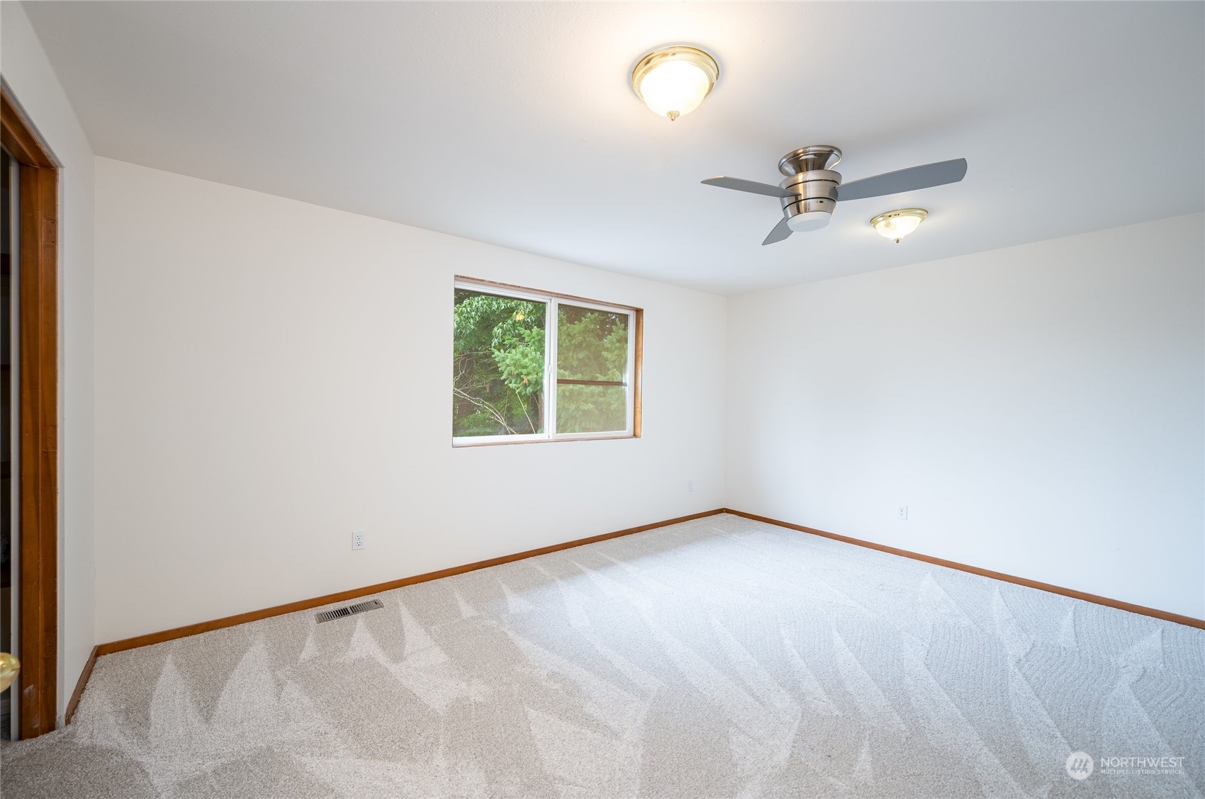 5730 Sand Road Bellingham, WA 98226 - Photo 28 of 40 a view of an empty room with a window