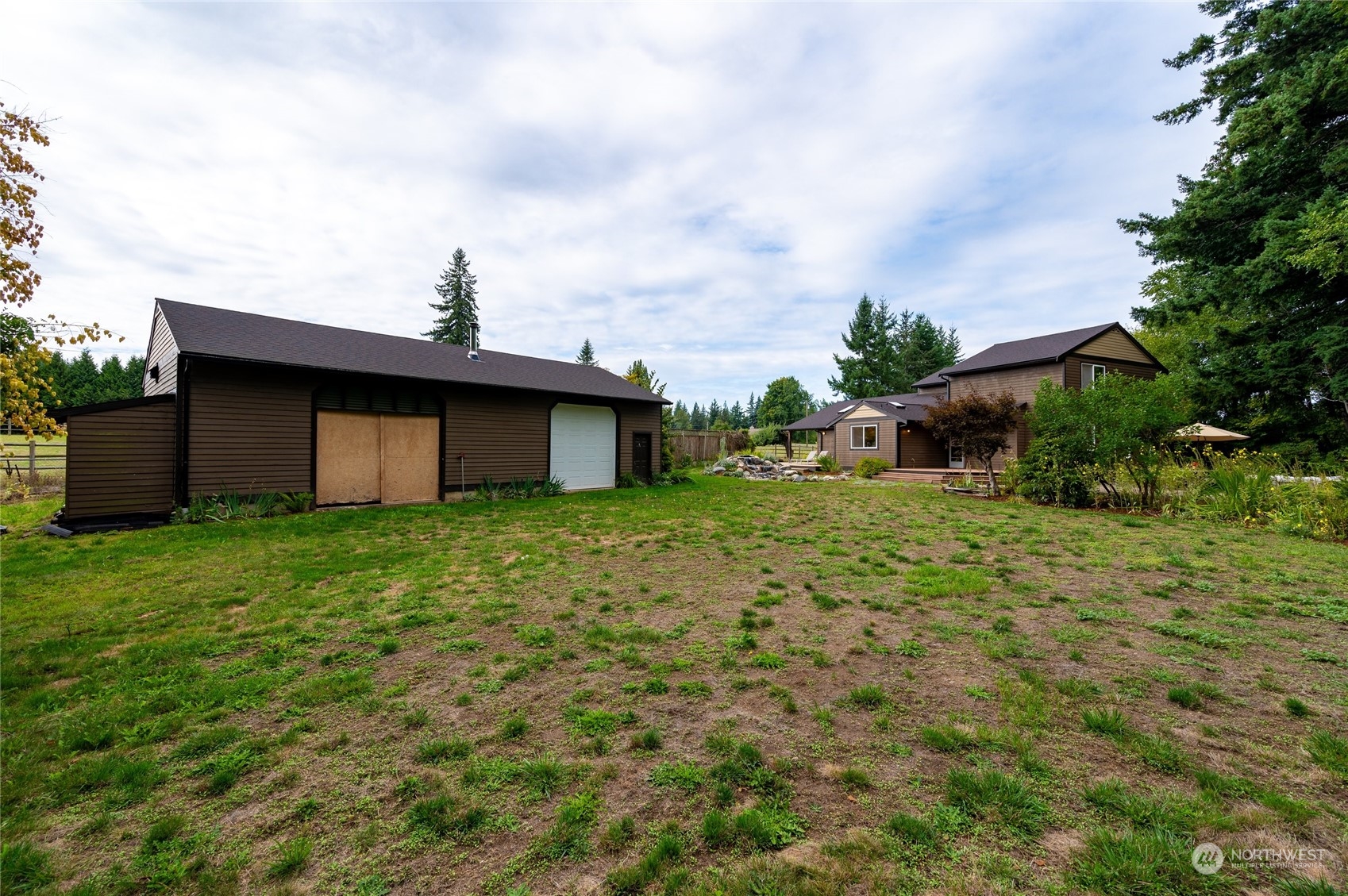 5730 Sand Road Bellingham, WA 98226 - Photo 34 of 40 a view of a house with backyard and garden