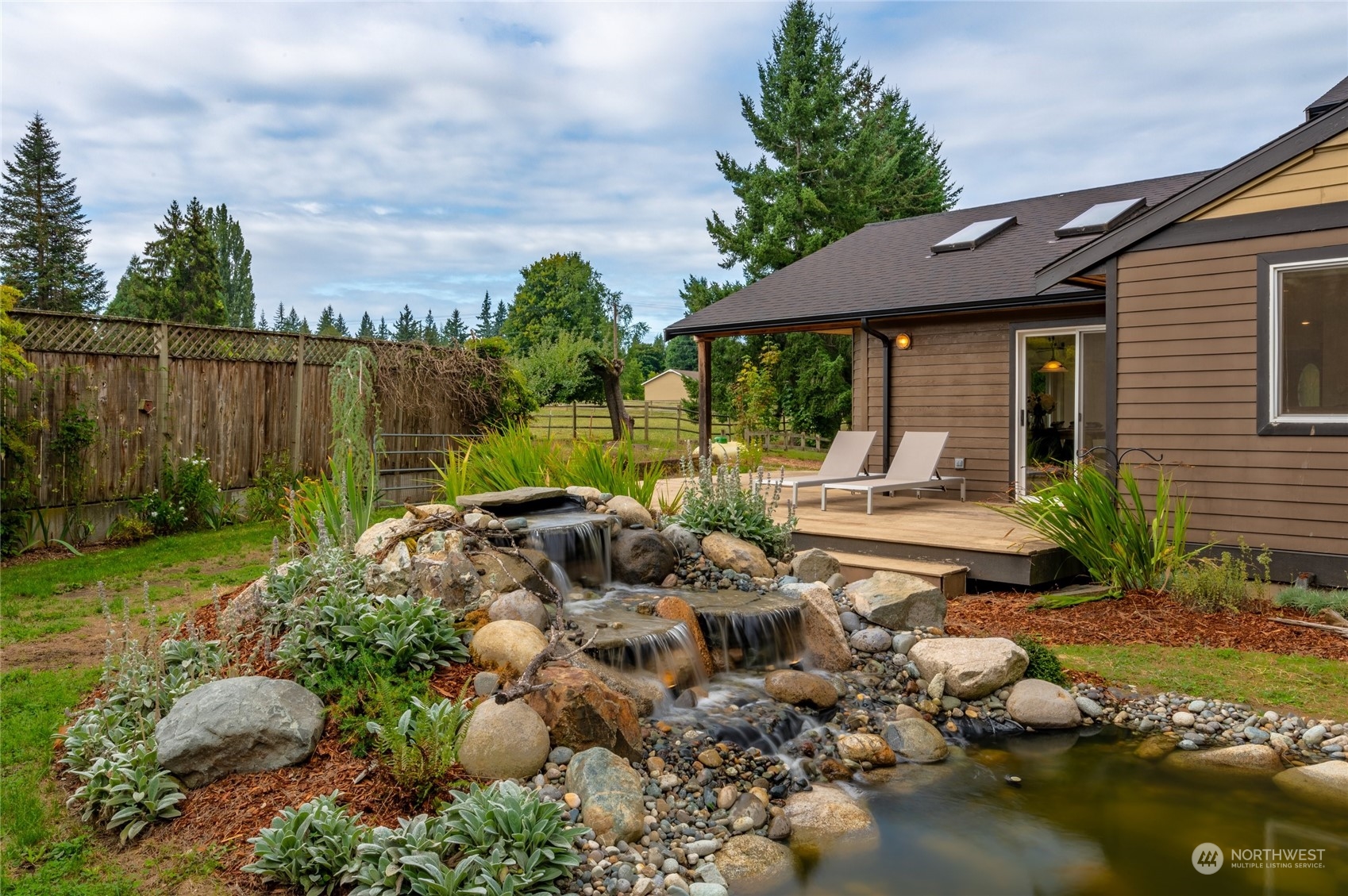 5730 Sand Road Bellingham, WA 98226 - Photo 35 of 40 a view of backyard with outdoor seating and green space