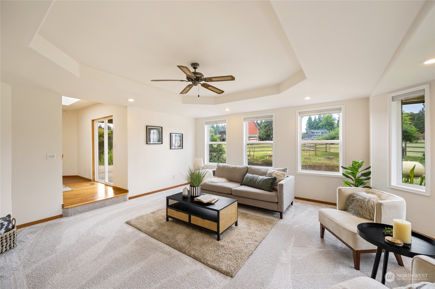 5730 Sand Road Bellingham, WA 98226 - Photo 10 of 40 a living room with furniture and a large window