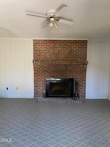 a living room with a fireplace