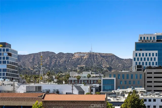 a view of city with tall buildings