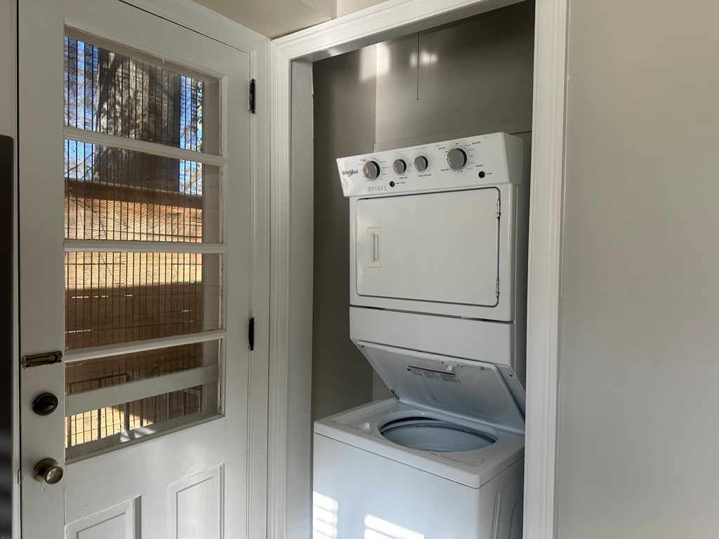 1312 10th Street, Unit B Columbus, GA 31906 - Photo 6 of 11 a utility room with dryer and washer