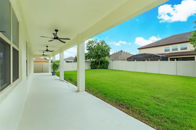 a view of a backyard of the house