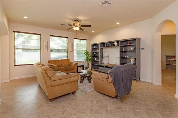 a living room with furniture and a window