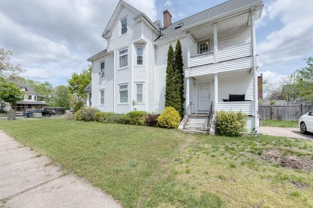 407-9 Sumner Avenue Springfield, MA 01108 - Photo 2 of 40 a view of a house with backyard