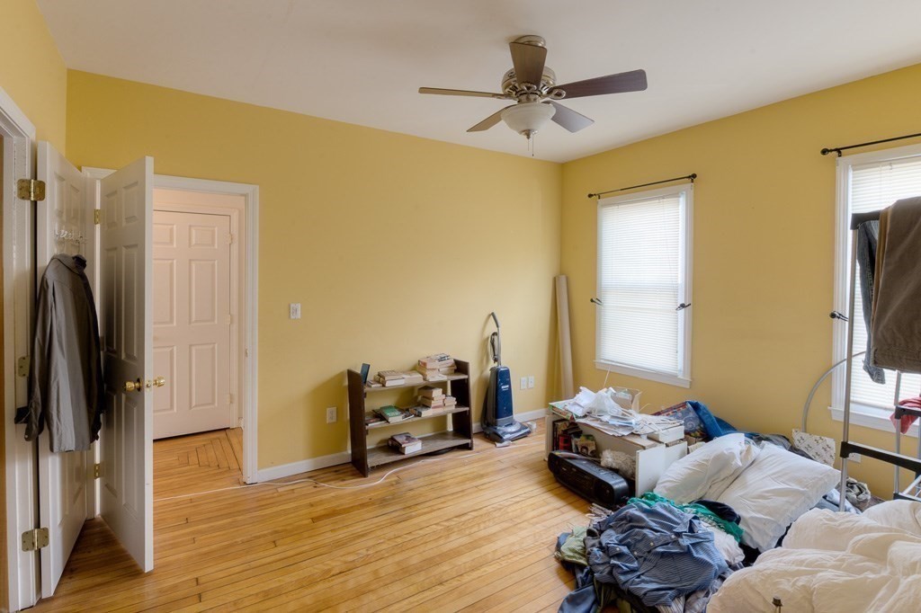 407-9 Sumner Avenue Springfield, MA 01108 - Photo 27 of 40 a living room with furniture and a flat screen tv