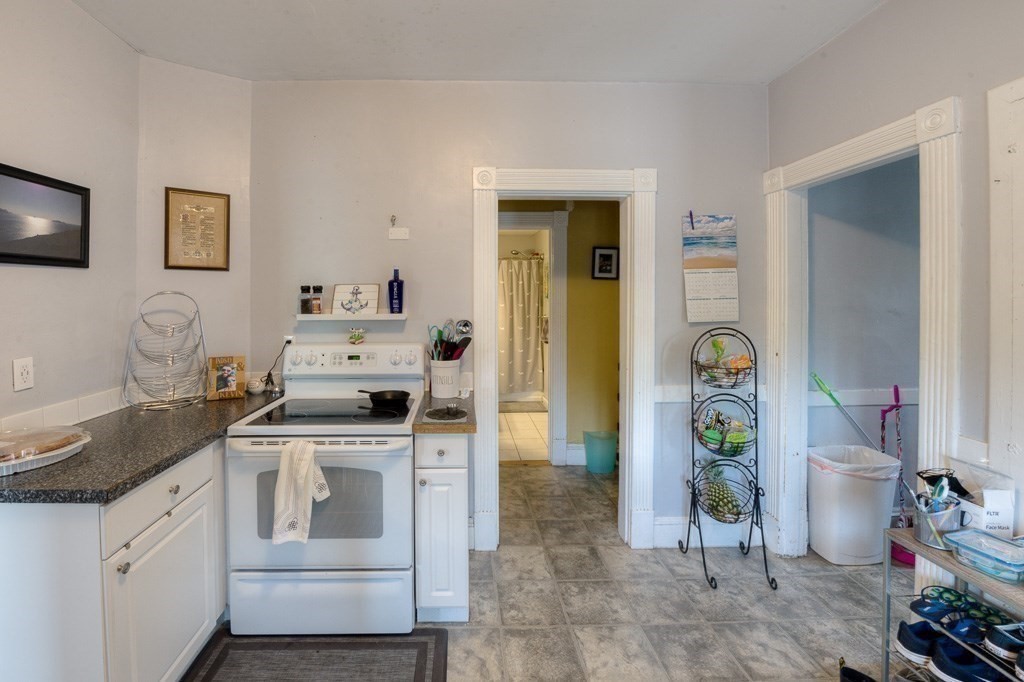 407-9 Sumner Avenue Springfield, MA 01108 - Photo 10 of 40 a kitchen with a stove and a sink