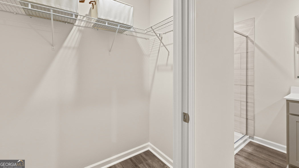 404 Reflection Drive Stockbridge, GA 30281 - Photo 46 of 57 a view of a room with racks on the wall