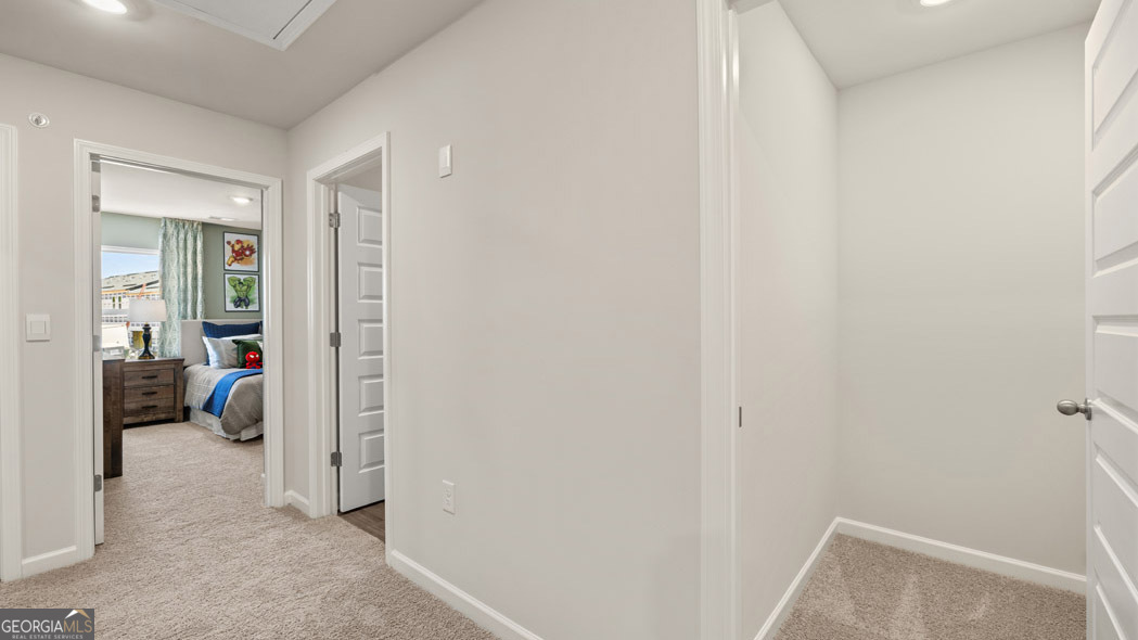 404 Reflection Drive Stockbridge, GA 30281 - Photo 49 of 57 a view of a bedroom from a hallway