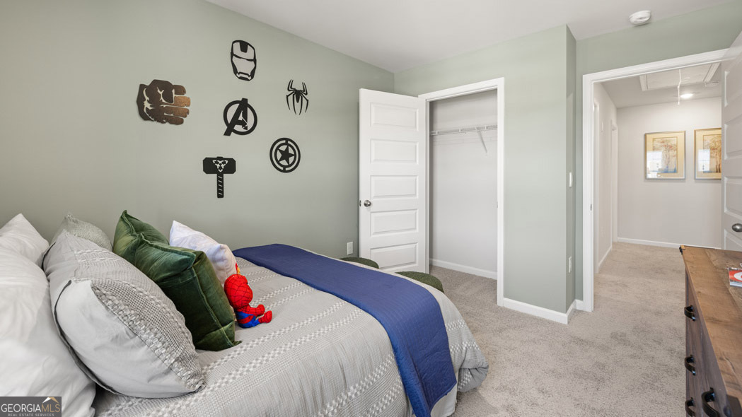 404 Reflection Drive Stockbridge, GA 30281 - Photo 56 of 57 a bedroom with a bed and a painting on the wall