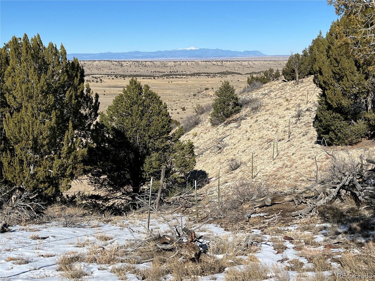 53 Horse Creek Road Pueblo, CO 81004 - Photo 23 of 34 a view of mountain view with wooden fence