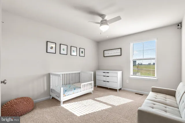 a bathroom with a walk in closet and bathroom