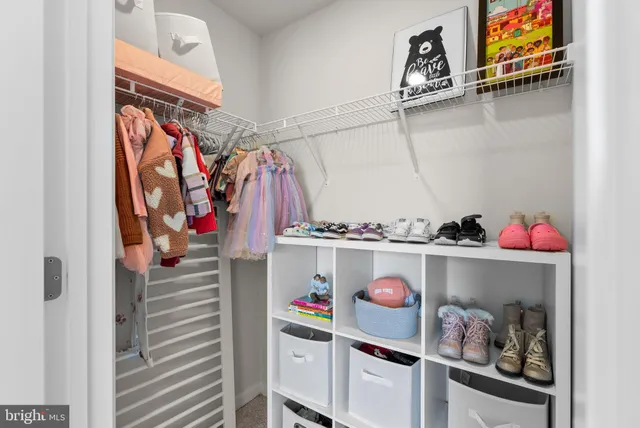 a en suite bathroom with a sink double vanity and a tub