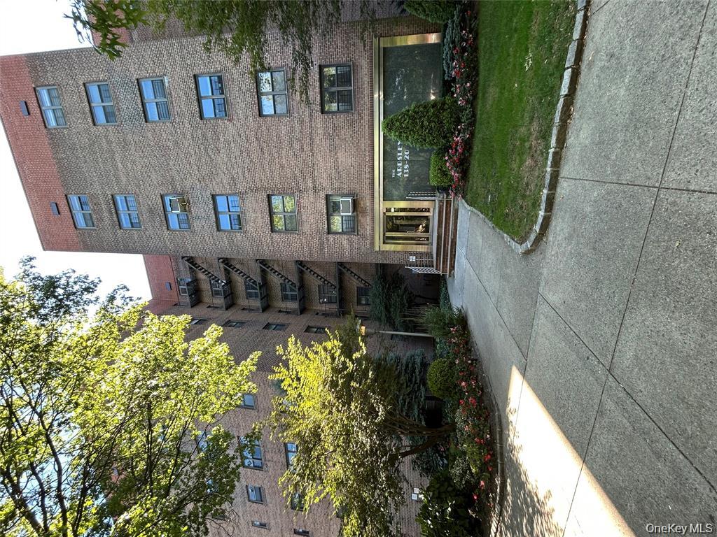 a view of a building with garden