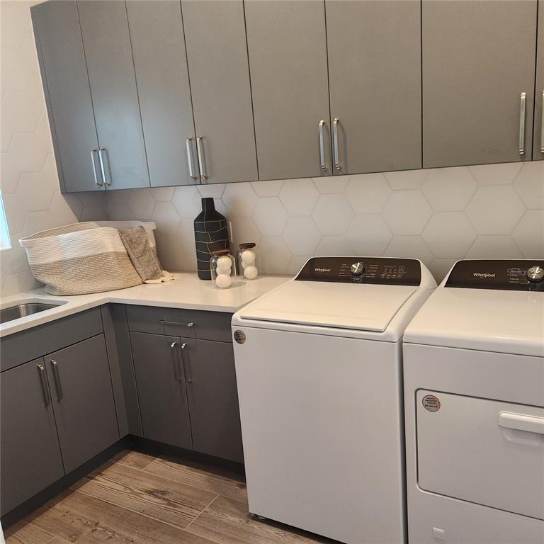 512 Blue Shell Loop Sarasota, FL 34240 - Photo 14 of 15 a utility room with dryer and washer