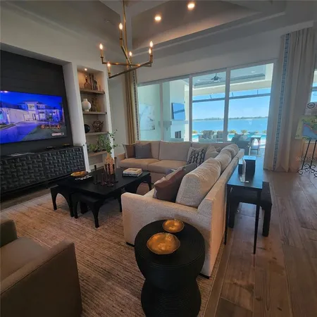 a dining table with chairs and wooden floor