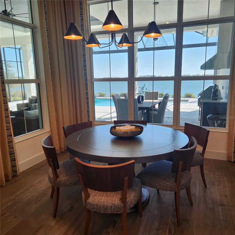 512 Blue Shell Loop Sarasota, FL 34240 - Photo 6 of 15 a view of a dining room with furniture and window