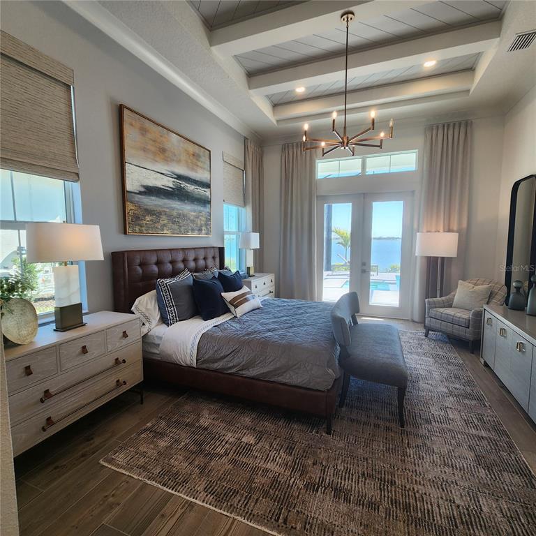512 Blue Shell Loop Sarasota, FL 34240 - Photo 7 of 15 a living room with furniture and a chandelier
