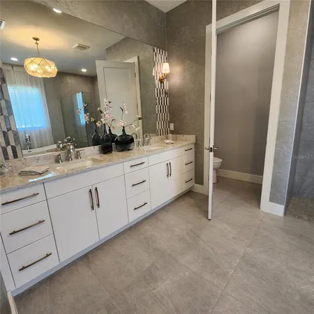 a white bath tub sitting in a bathroom