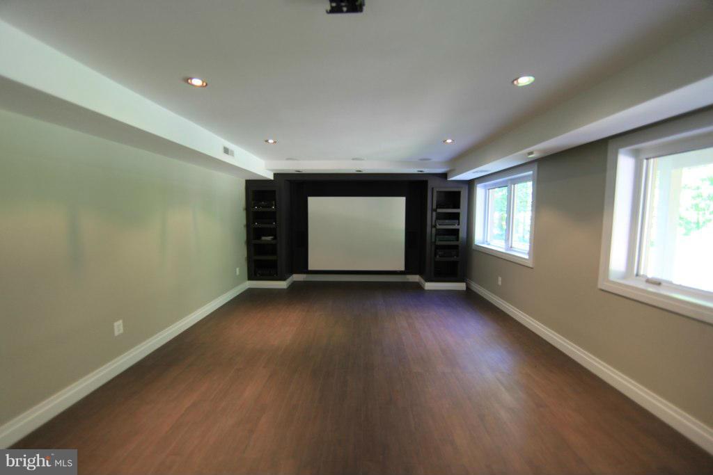 7827 Langley Ridge Road McLean, VA 22102 - Photo 24 of 30 Media Room with 100" screen and projector