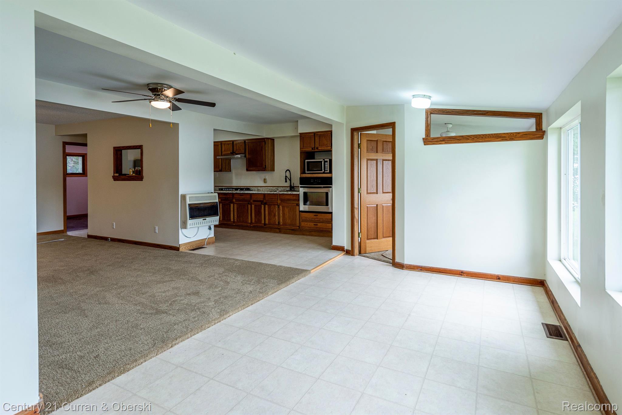 9688 Boucher Road Otter Lake, MI 48464 - Photo 10 of 24 Family room to dining area