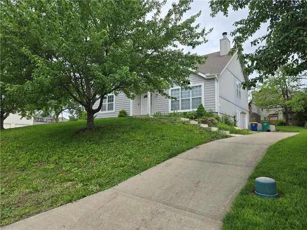 $410,000 | 2128 Southwest British Drive, Lee's Summit, MO 64081