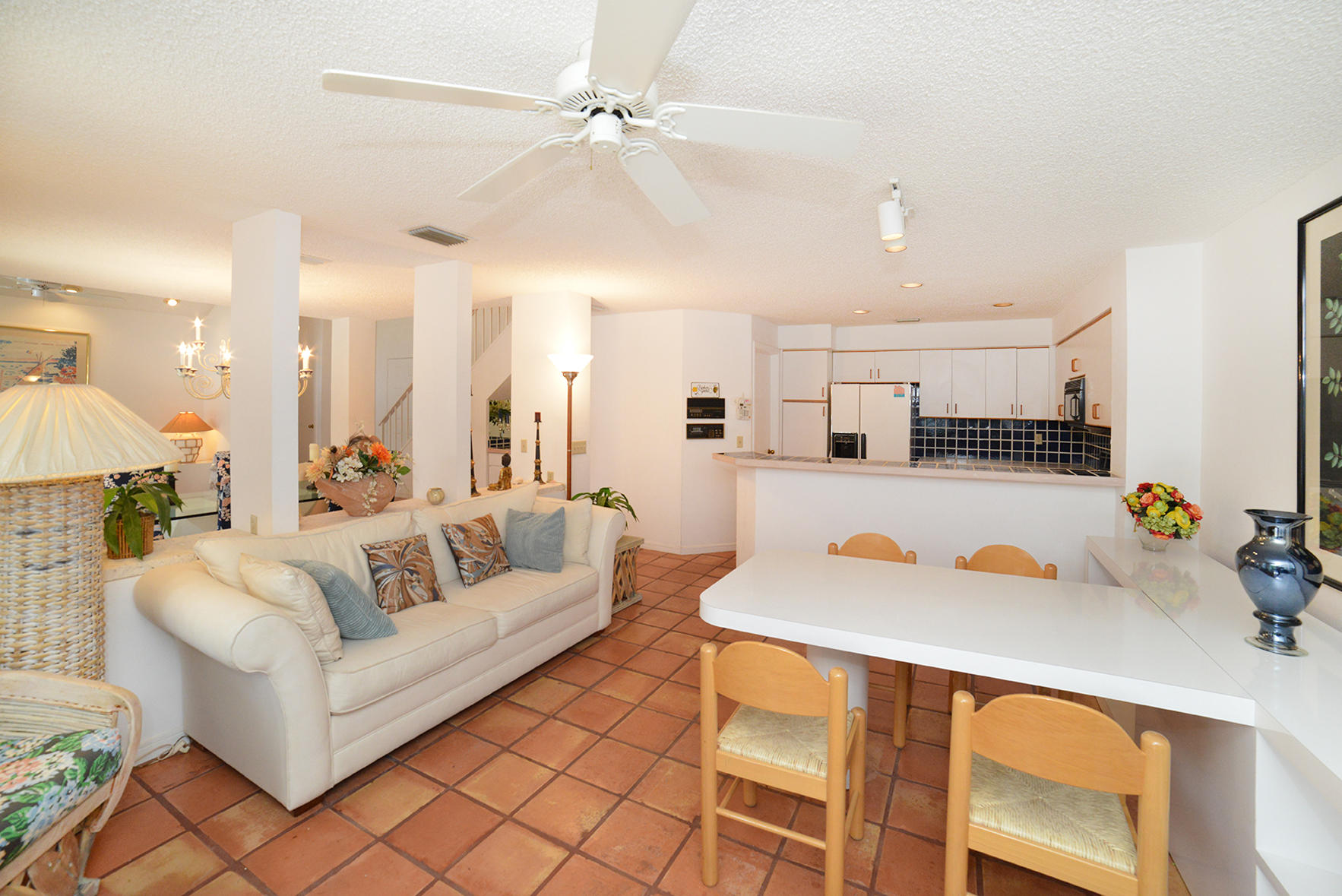 2168 Northwest 53rd Street Boca Raton, FL 33496 - Photo 14 of 31 a living room with furniture and kitchen view