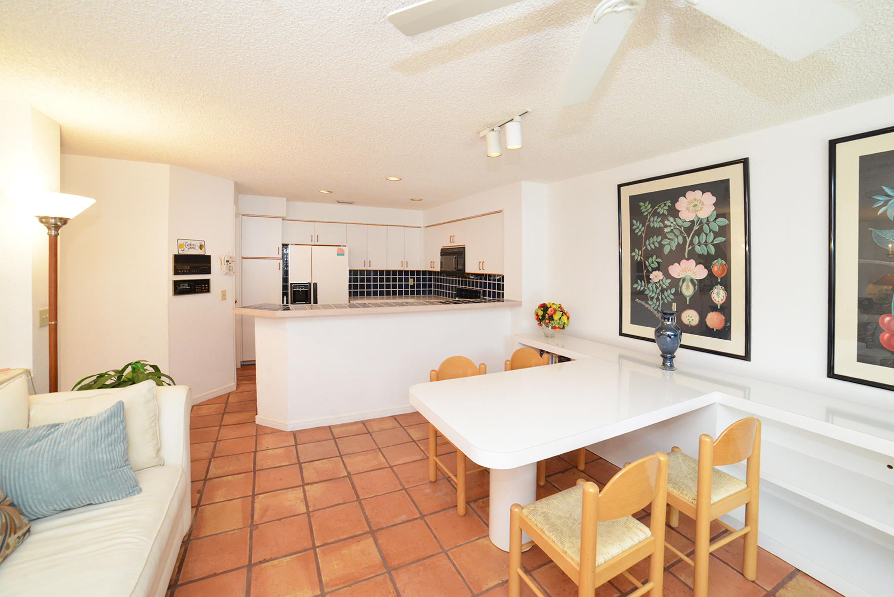 2168 Northwest 53rd Street Boca Raton, FL 33496 - Photo 15 of 31 a living room with stainless steel appliances furniture and a kitchen view